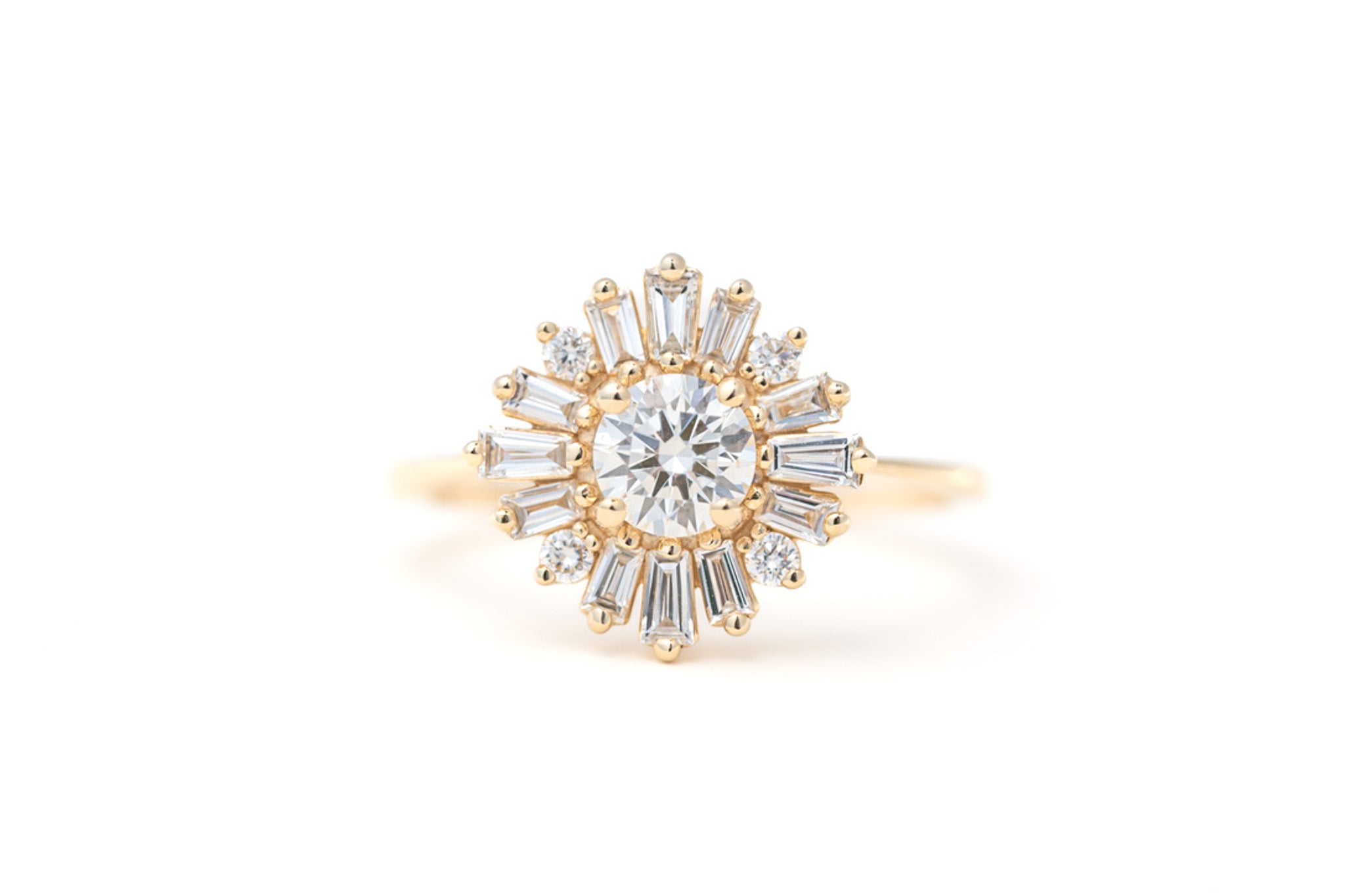 Diamond ring with gold band on a white background